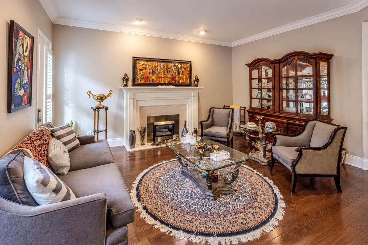 Living room in a Richmond Hill house after a load-bearing wall removal, where the drawing set had to show the beam, posts and load path