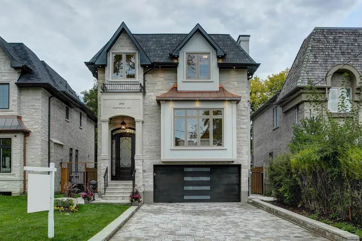 New North York house with a lawn sign out front, the moment to check for an open permit when buying a house in Toronto